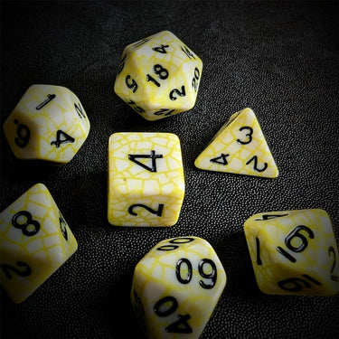 Cracked Yellow on White Acrylic - 7pcs RPG Full Dice Set Scatter