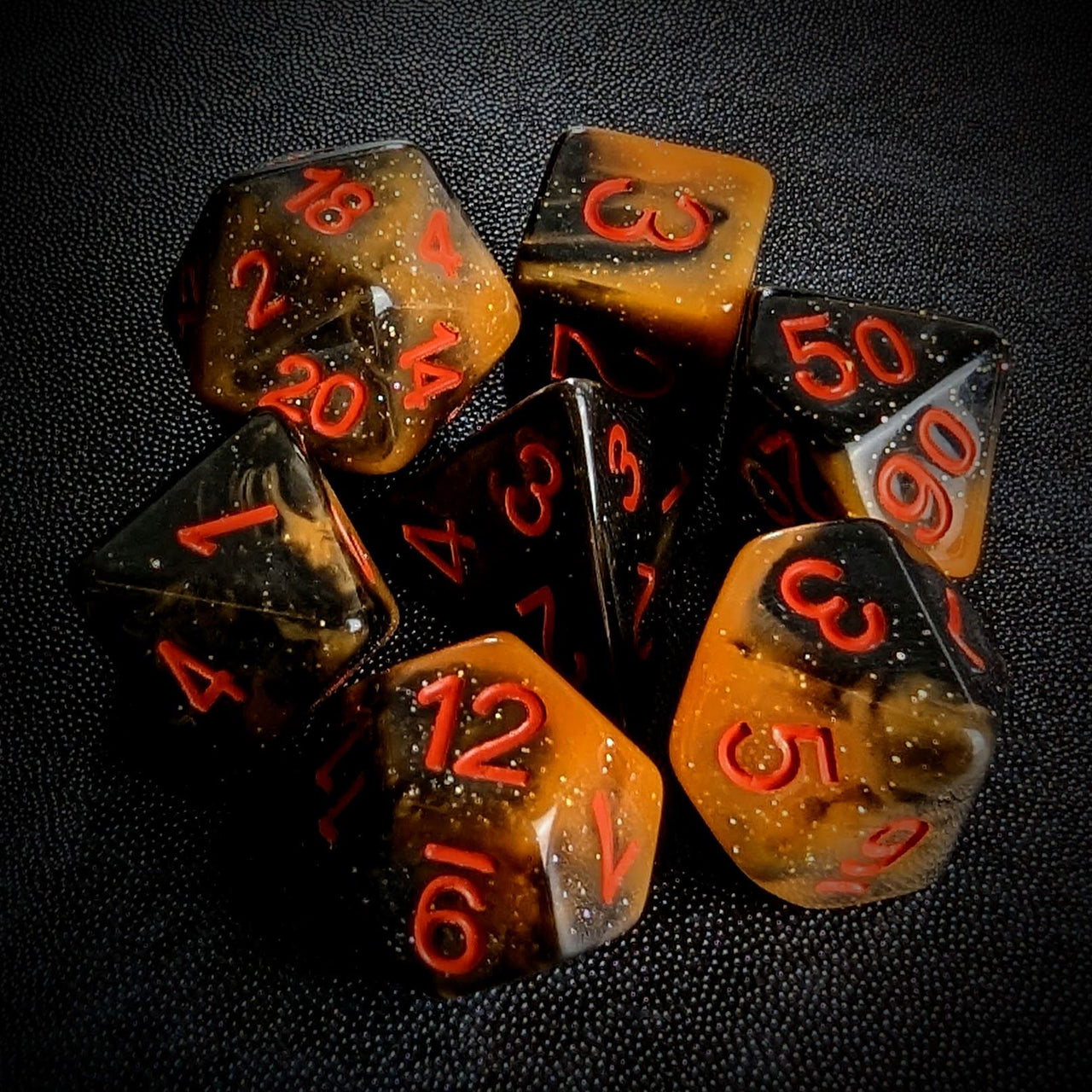 Glitter in Black & Orange Acrylic - 7pcs RPG Full Dice Set Top