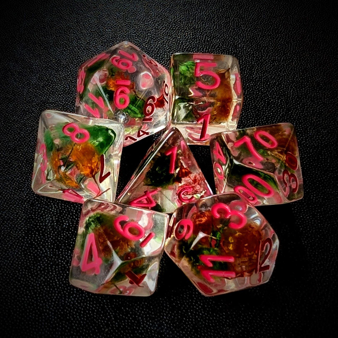 Red & Green Flowers in Clear Resin - 7pcs RPG Full Dice Set