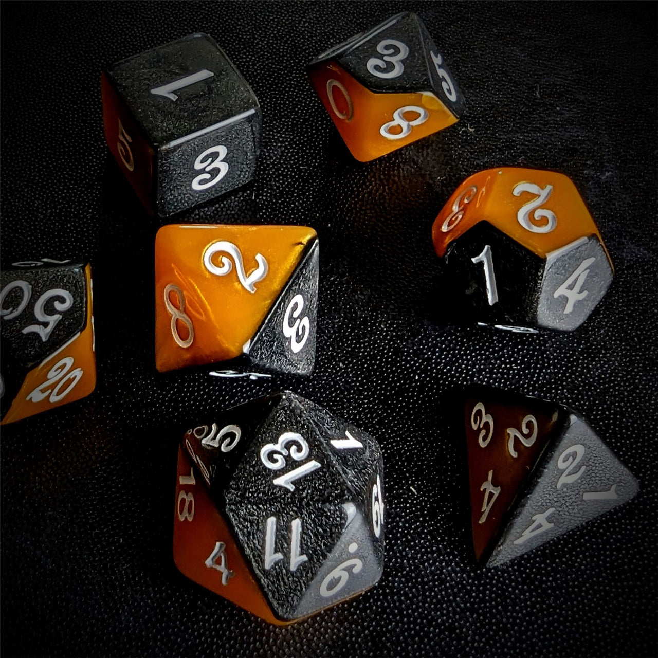 Blend of Black & Orange Acrylic - 7pcs RPG Full Dice Set Scatter