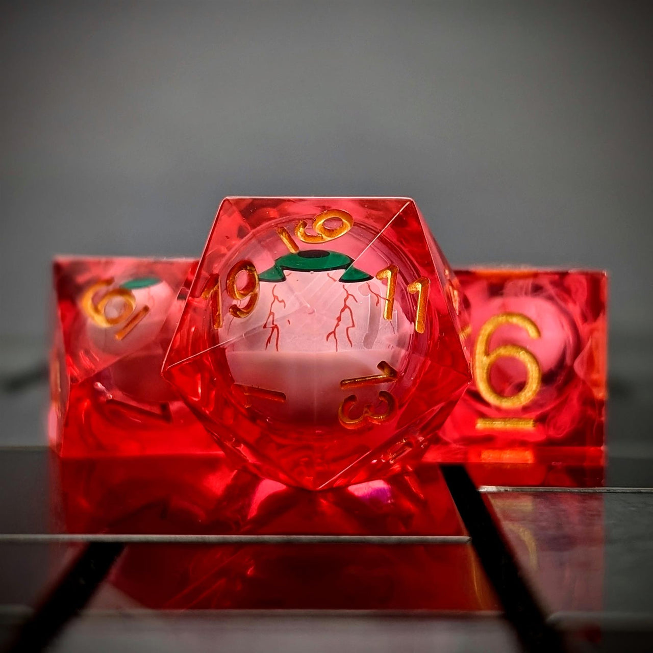 Green Eye Ball in Clear & Red Liquid Filled Sharp Resin - 7pcs RPG Dice Set