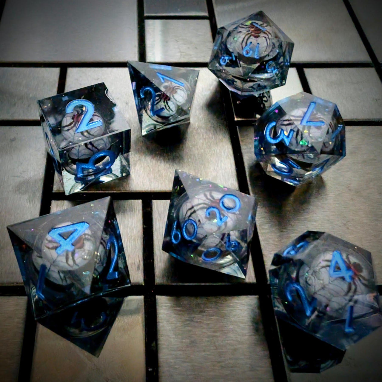 Spider Ball in Clear & Black Filled Sharp Resin - 7pcs RPG Dice Set