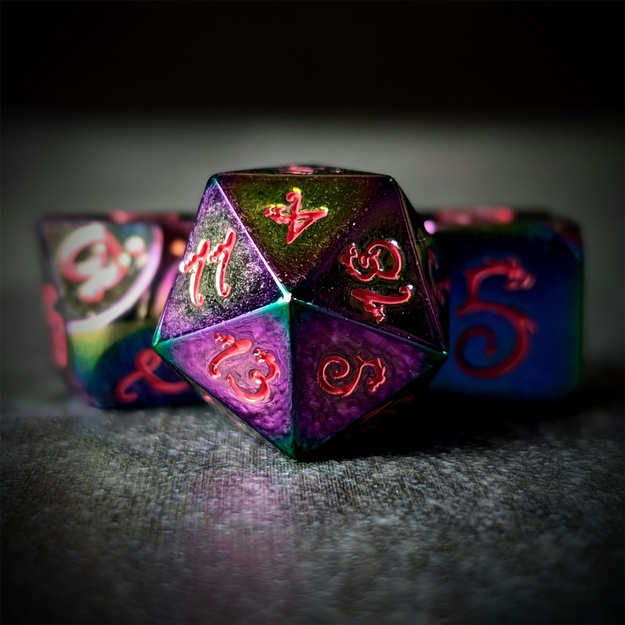 Rainbow Metal with Pink Dragon Font - 7pcs RPG Dice Set