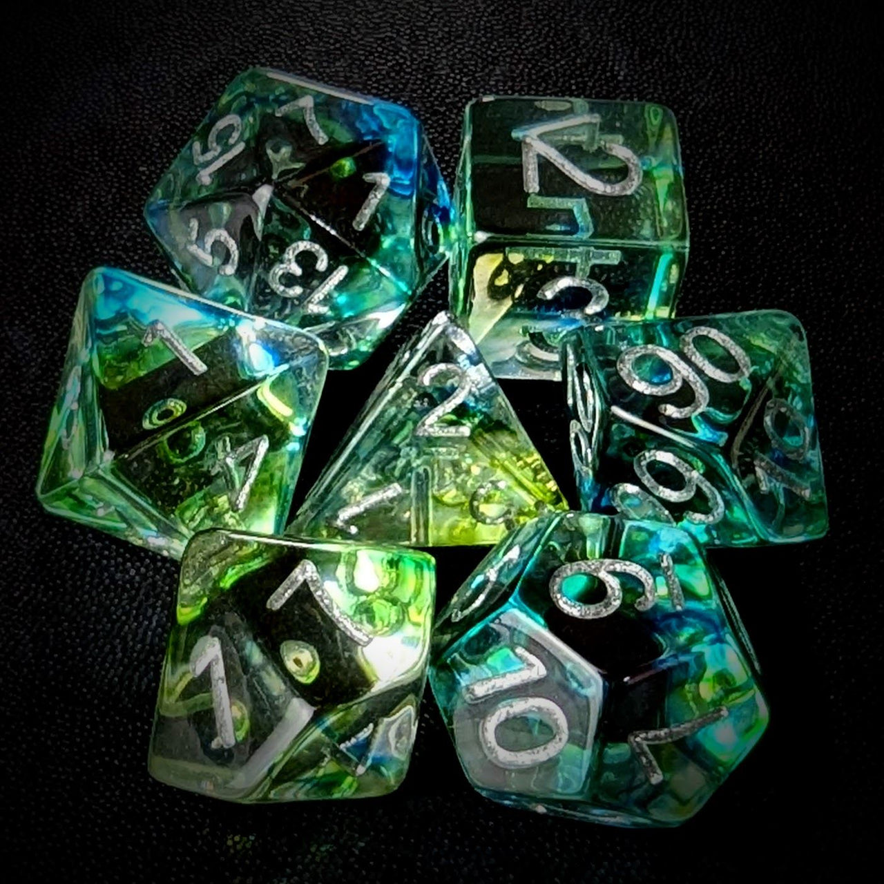 Green & Black with Blue Swirl in Clear Resin - 7pcs RPG Full Dice Set