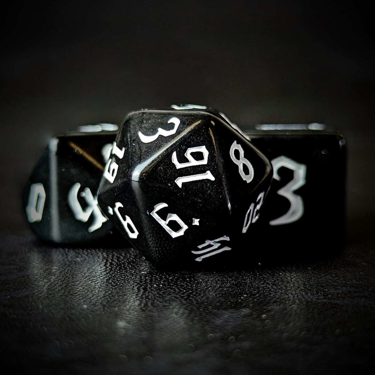 White on Solid Black Acrylic - 7pcs RPG Full Dice Set Close