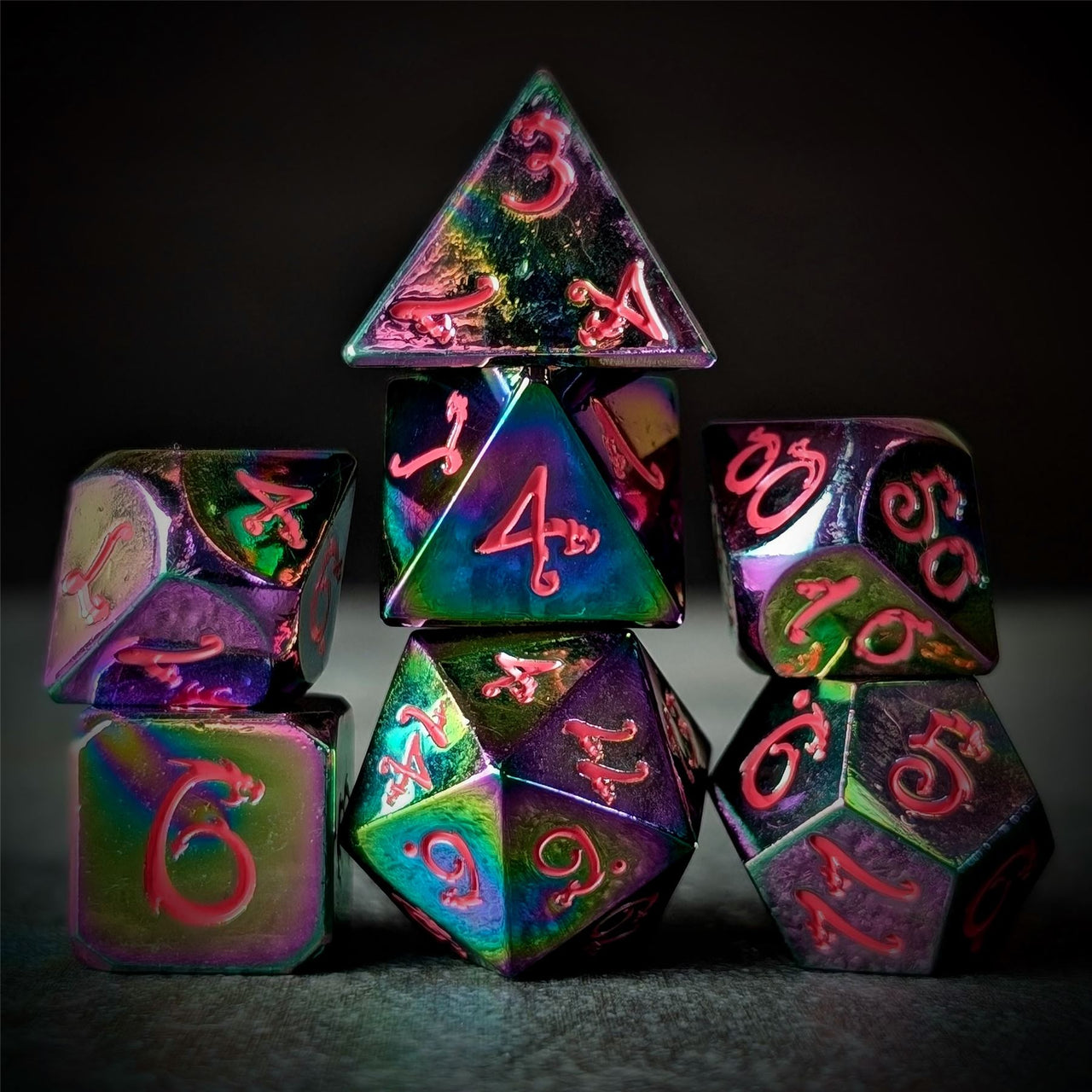 Rainbow Metal with Pink Dragon Font - 7pcs RPG Dice Set