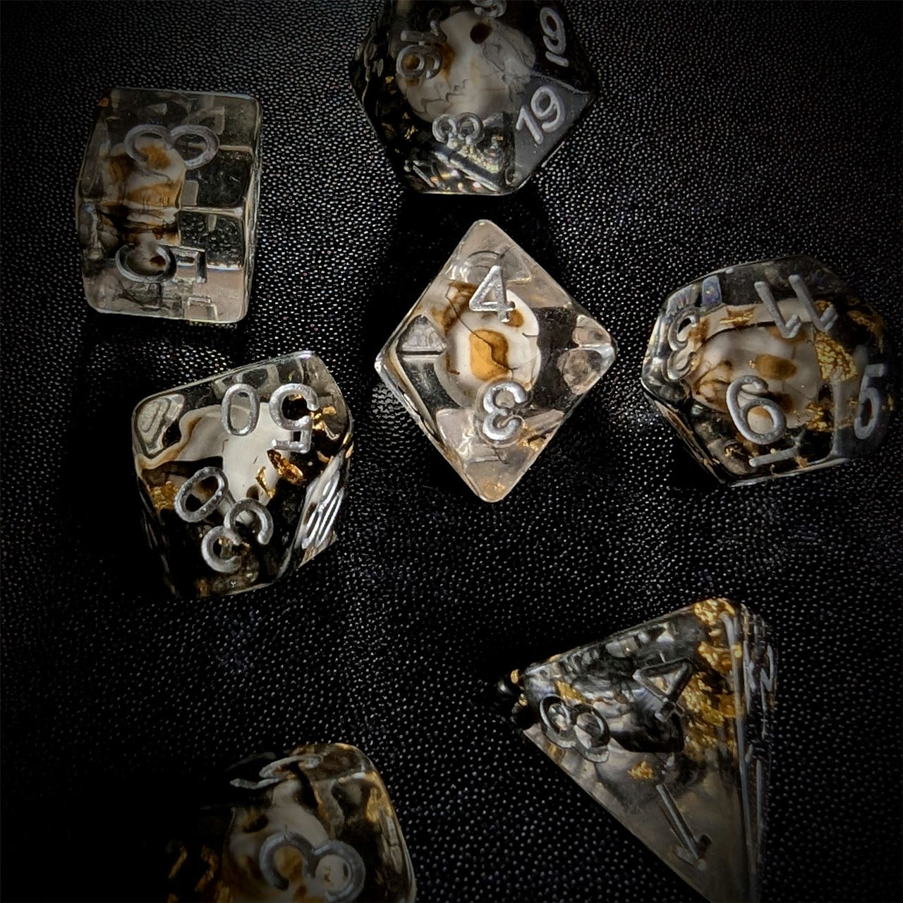 Skull with Gold Foil in Black & Clear Resin - 7pcs RPG Full Dice Set