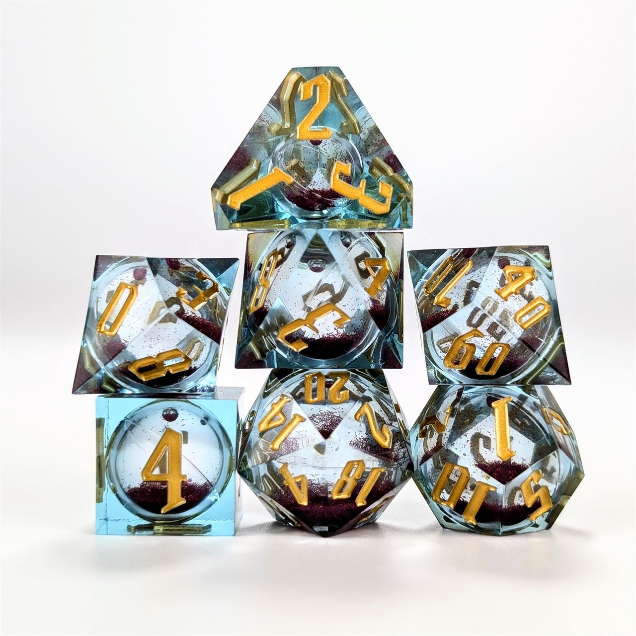 Pink Glitter in Blue & Clear Liquid Filled Sharp Resin - 7pcs RPG Dice Set
