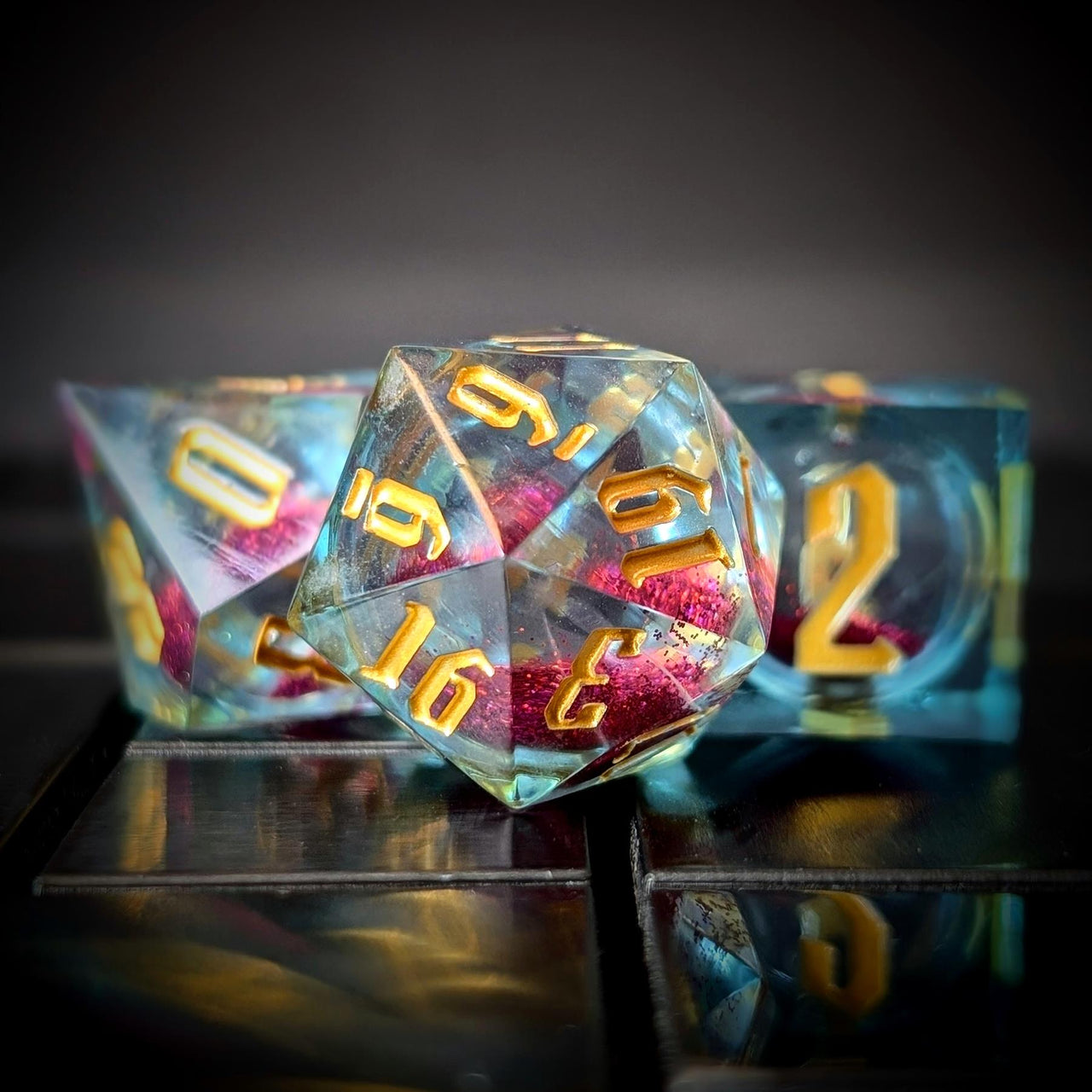 Pink Glitter in Blue & Clear Liquid Filled Sharp Resin - 7pcs RPG Dice Set