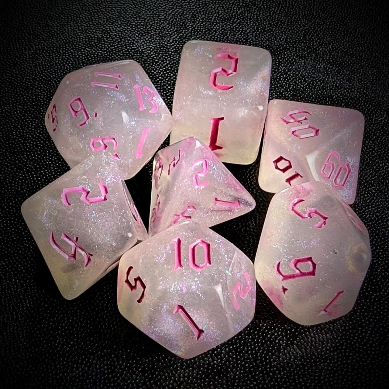 Glitter in White Acrylic with Pink Font - 7pcs RPG Full Dice Set Top