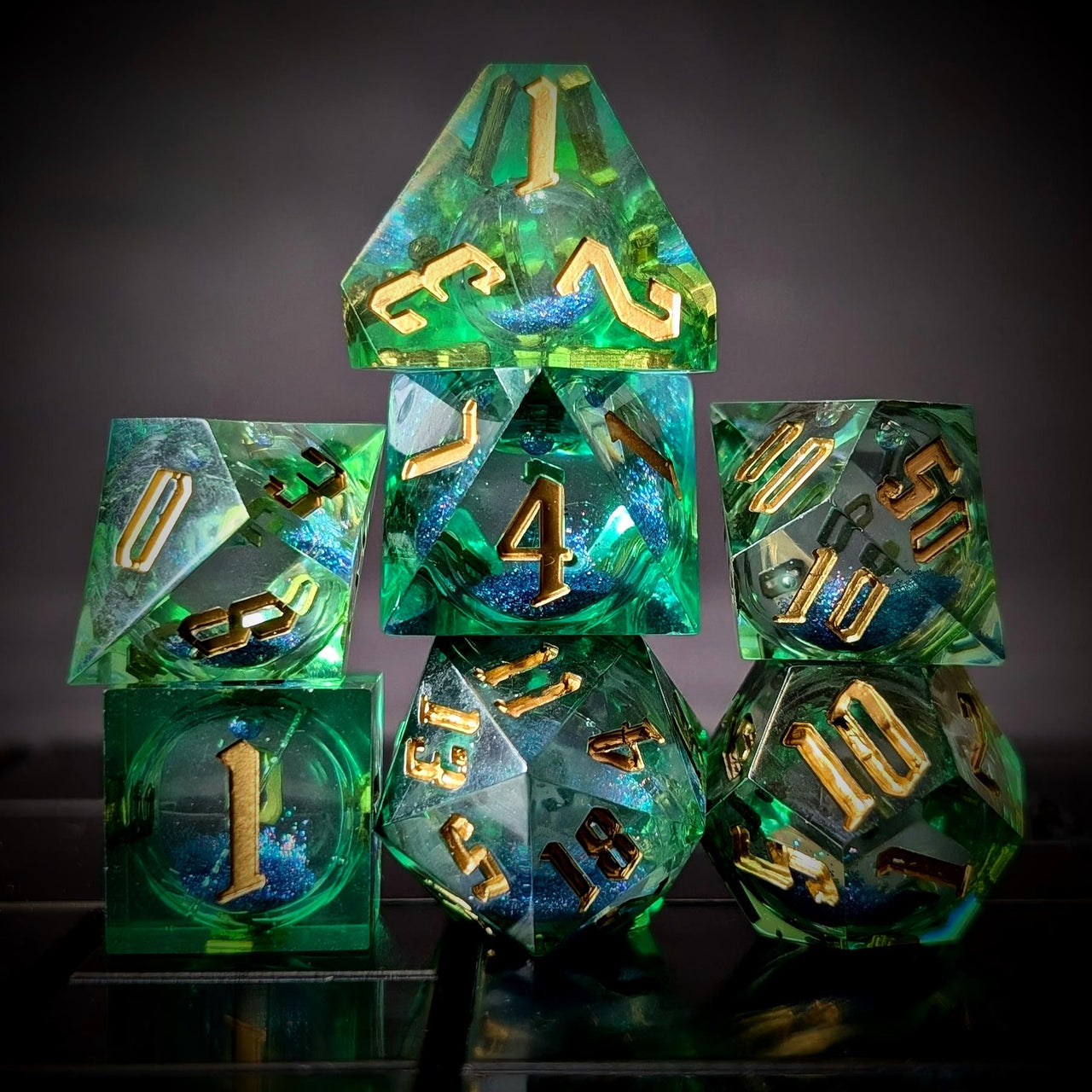 Blue Glitter in Green & Clear Liquid Filled Sharp Resin - 7pcs RPG Dice Set