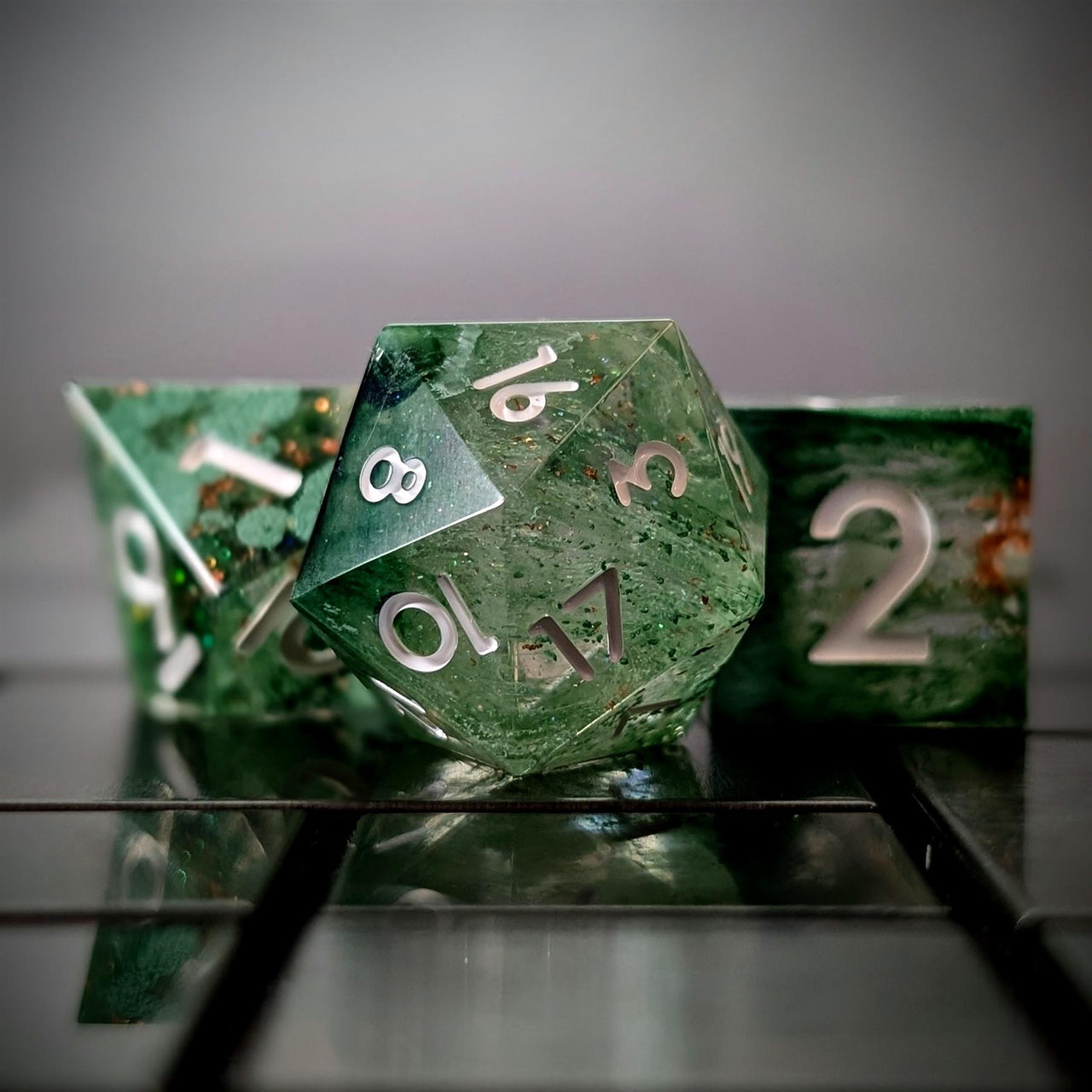 Moss in Layered Clear and Black Sharp Resin - 7pcs RPG Dice Set