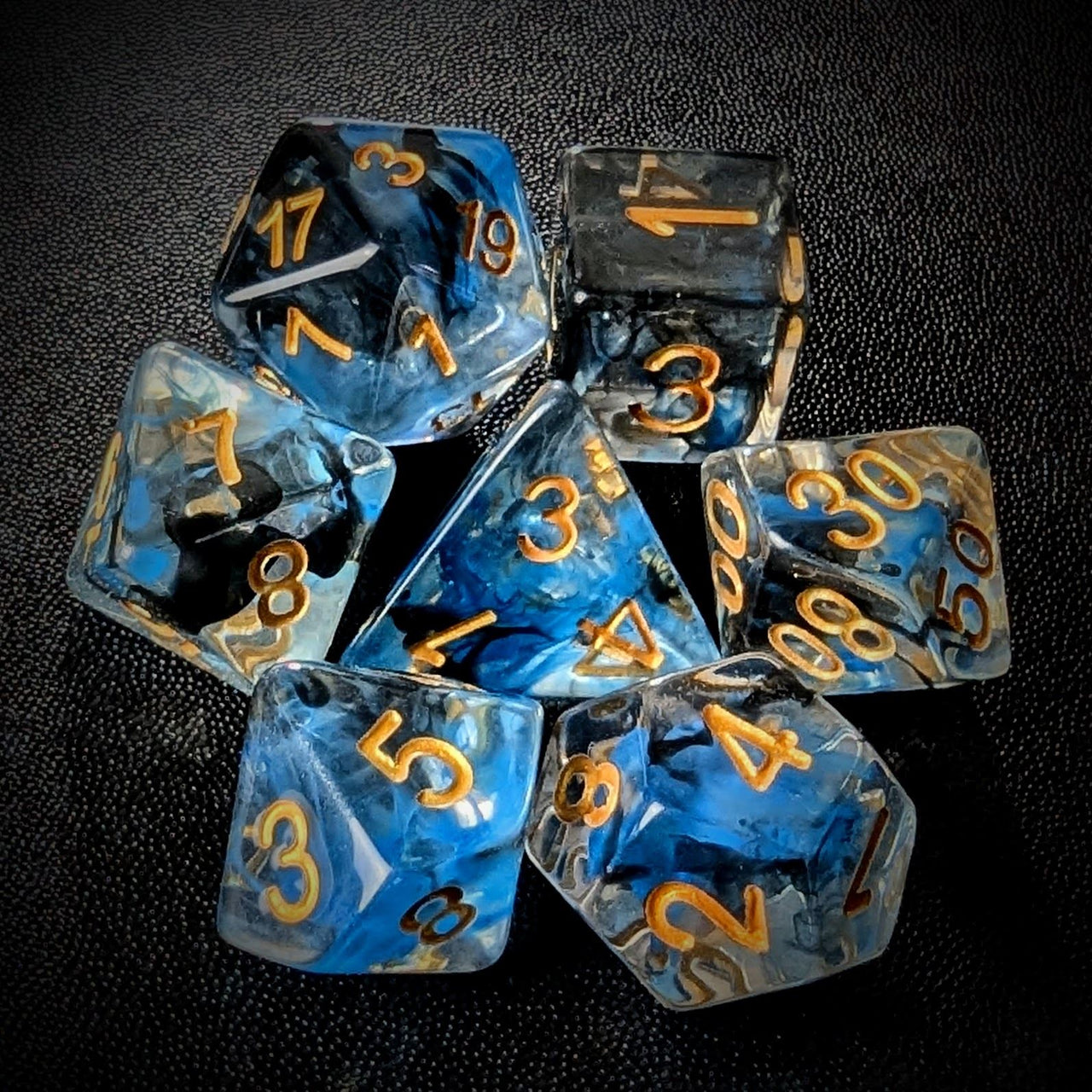 Blue & Black Swirl in Clear Resin - 7pcs RPG Full Dice Set