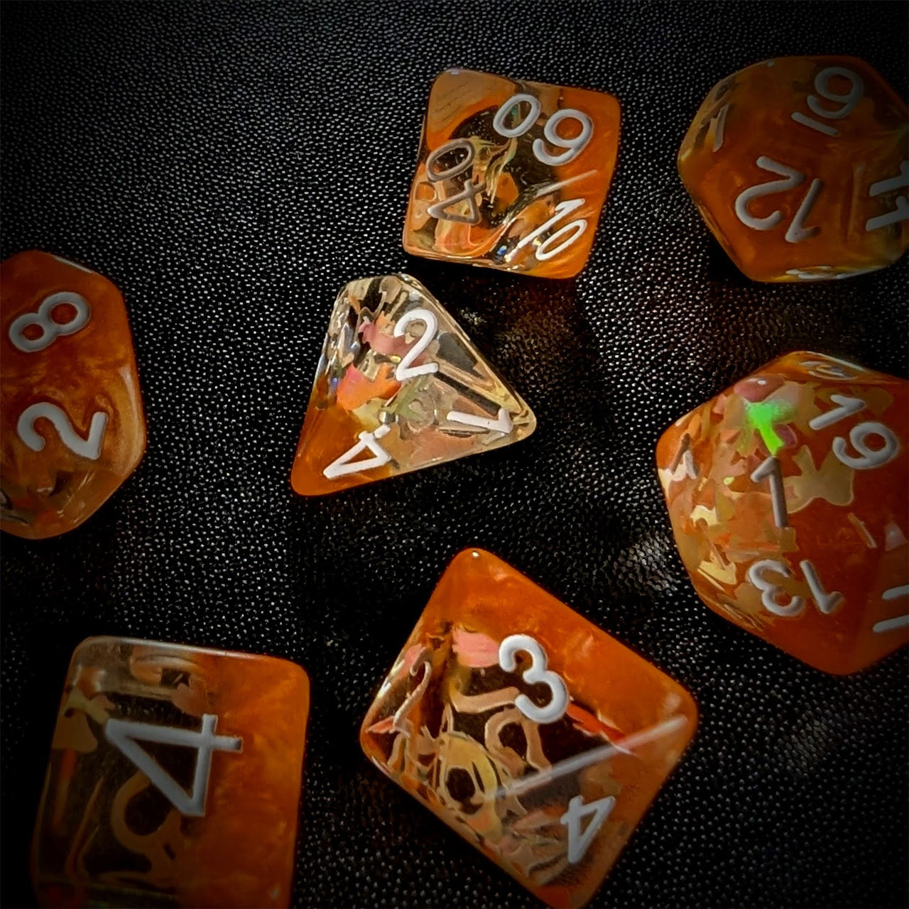 Bow in Clear & Orange Resin - 7pcs RPG Full Dice Set