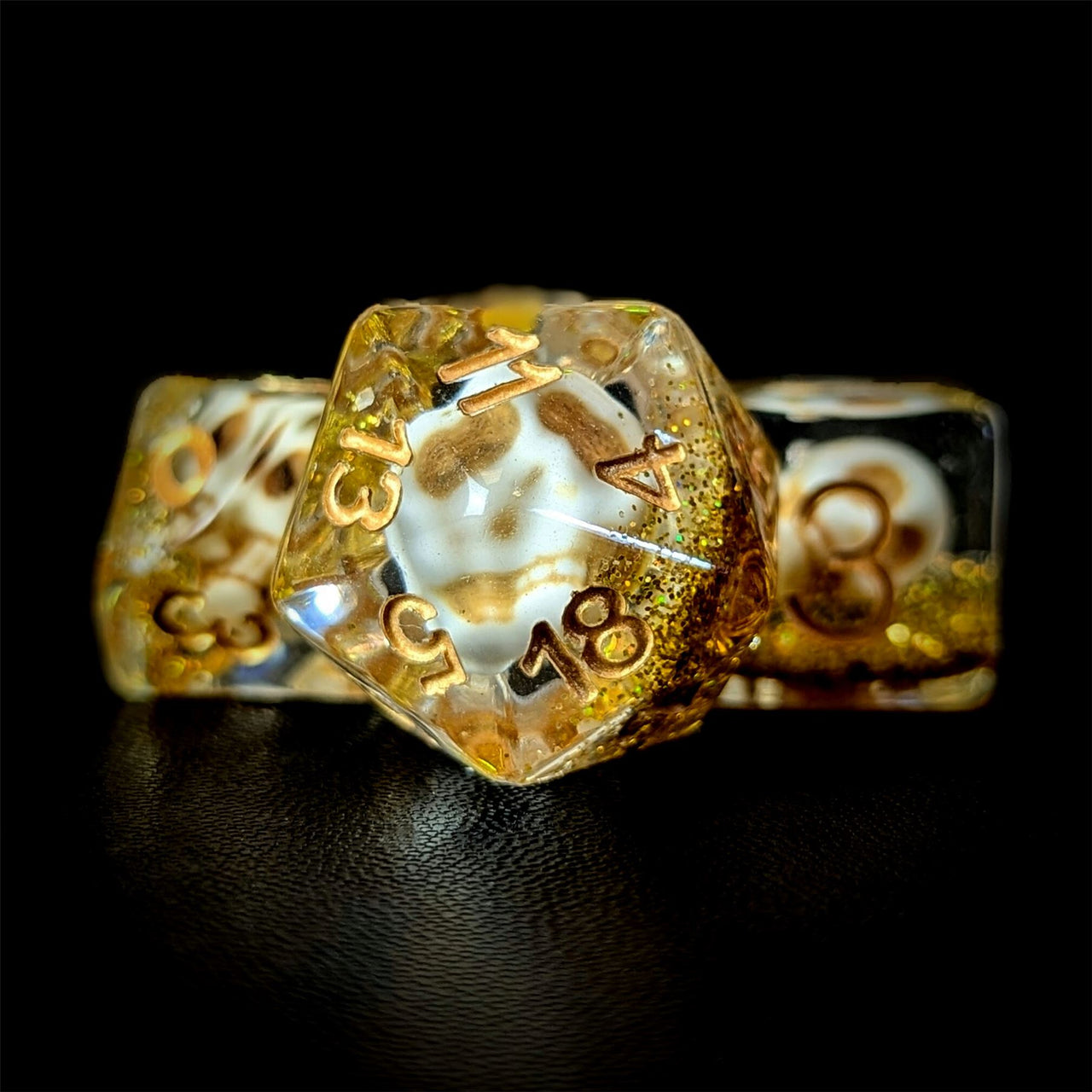 Skull & Gold Glitter in Clear Resin - 7pcs RPG Full Dice Set