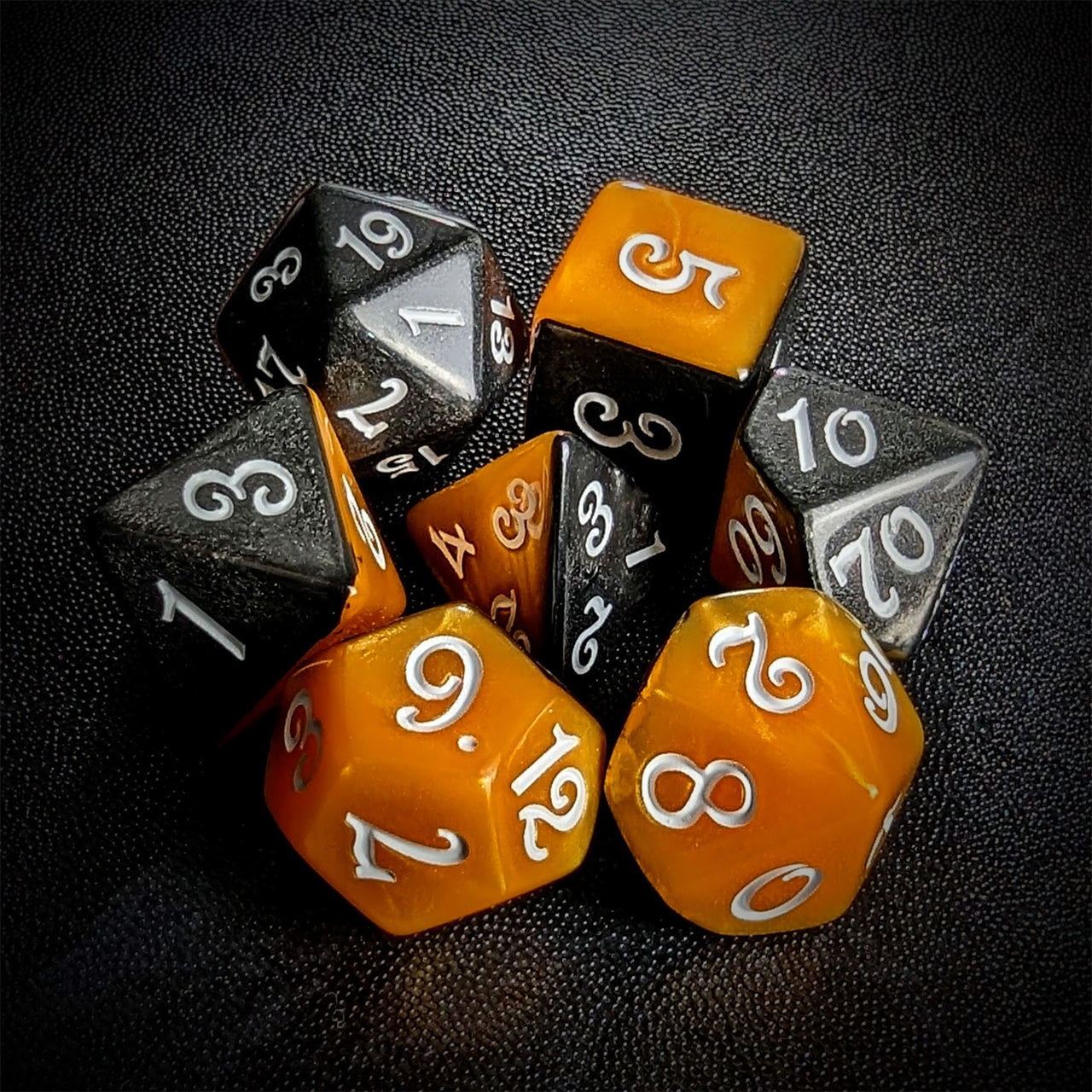 Blend of Black & Orange Acrylic - 7pcs RPG Full Dice Set Top