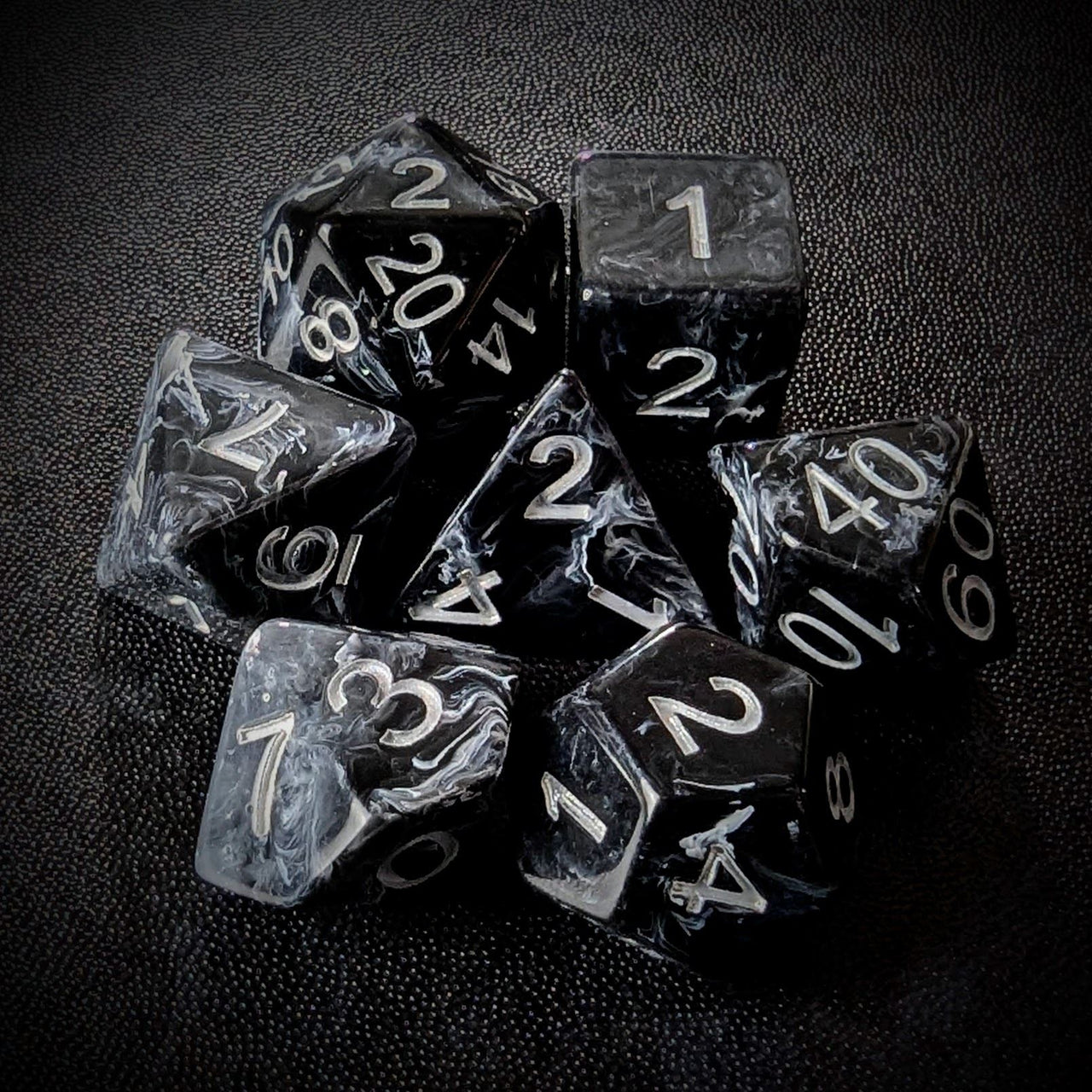 White Swirl in Black Resin - 7pcs RPG Full Dice Set