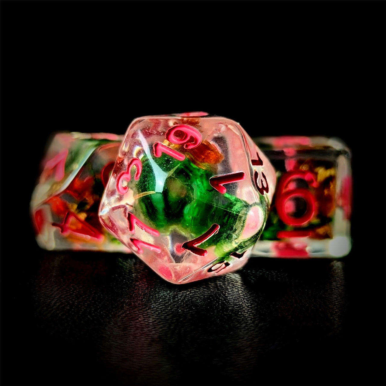 Red & Green Flowers in Clear Resin - 7pcs RPG Full Dice Set