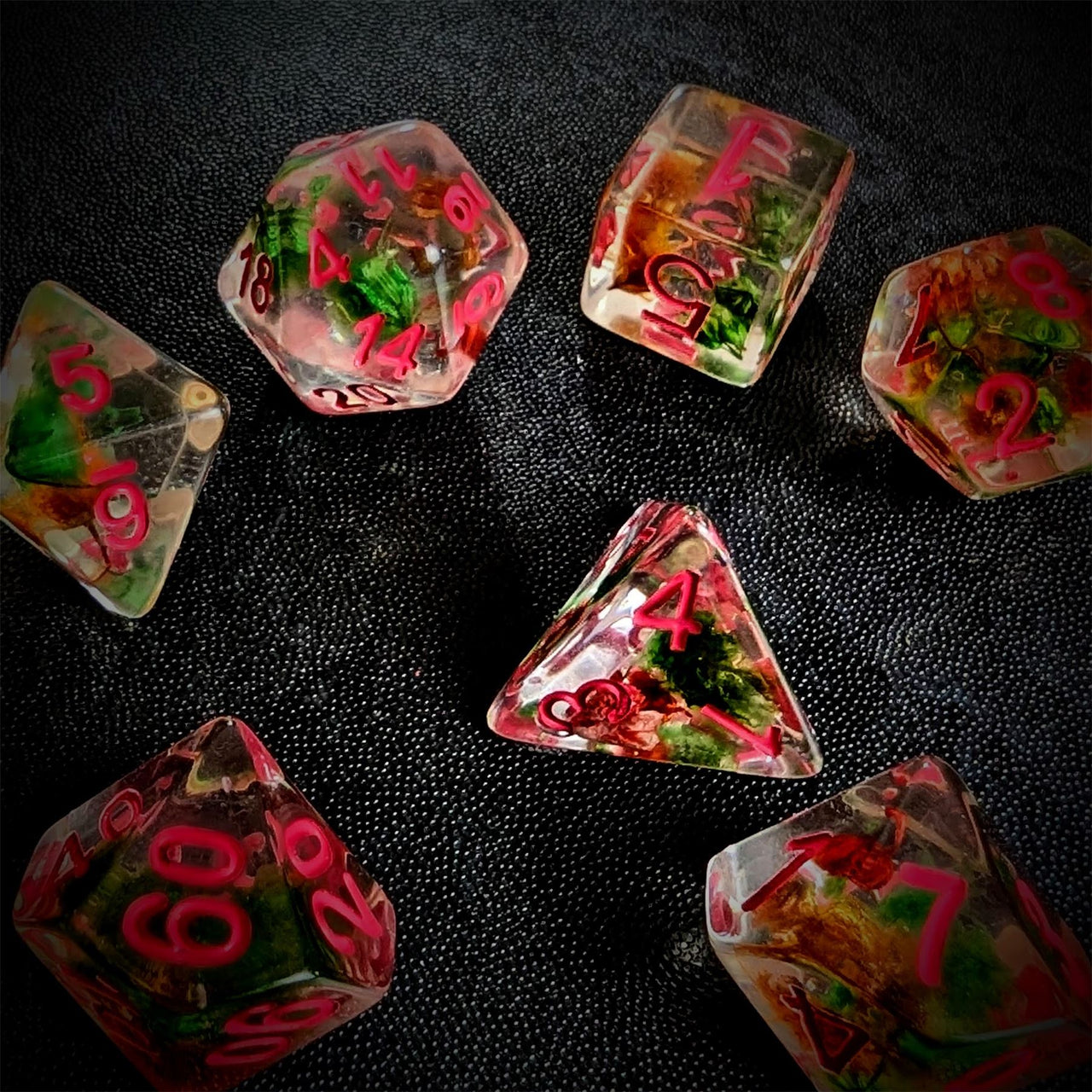 Red & Green Flowers in Clear Resin - 7pcs RPG Full Dice Set