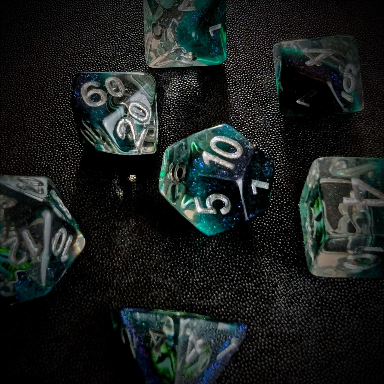 Demon Eye in Clear Green & Teal Resin - 7pcs RPG Full Dice Set