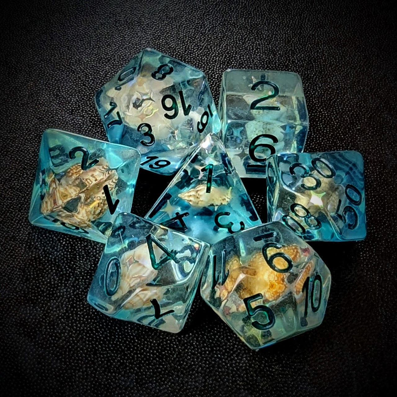 Shell in Clear & Blue Resin - 7pcs RPG Full Dice Set