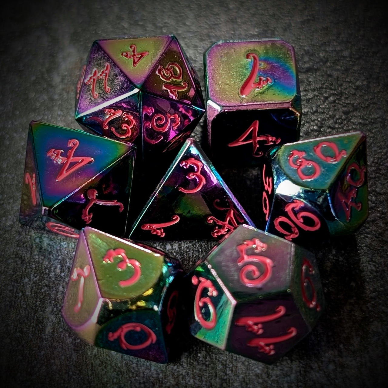 Rainbow Metal with Pink Dragon Font - 7pcs RPG Dice Set