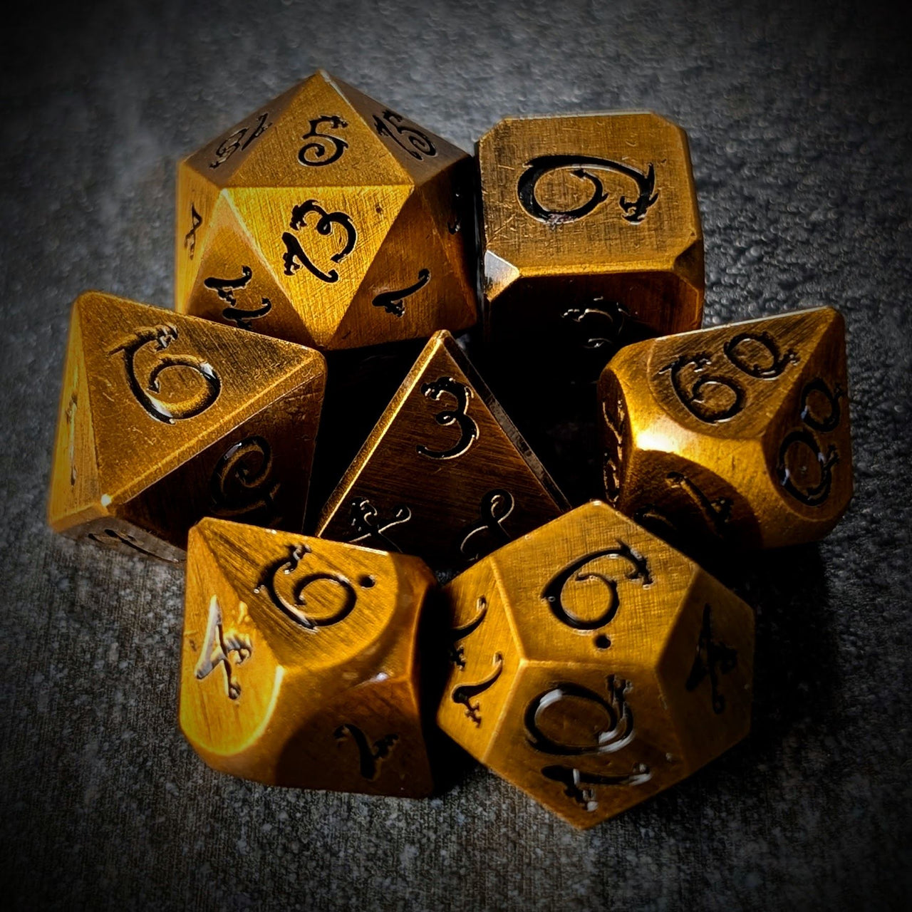 Gold Metal with Black Dragon Font - 7pcs RPG Dice Set