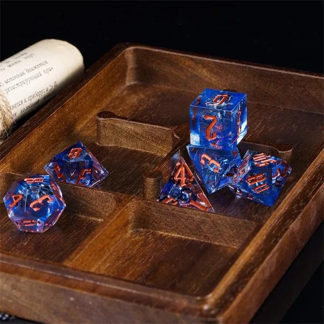 Spider in Clear & Blue Filled Sharp Resin - 7pcs RPG Dice Set