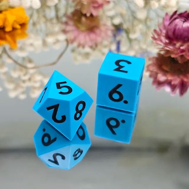 Black on Solid blue Silicone - 7pcs RPG Full Dice Set