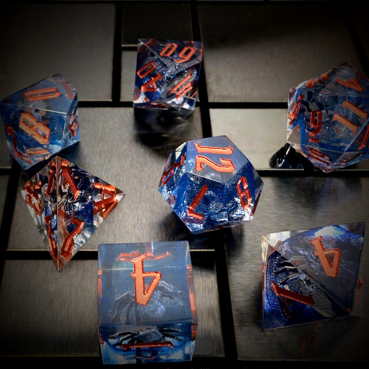 Spider in Clear & Blue Filled Sharp Resin - 7pcs RPG Dice Set
