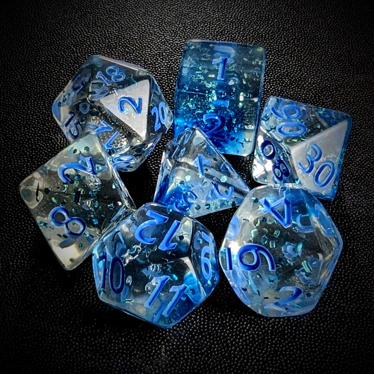 Glitter in Clear Blue Acrylic - 7pcs RPG Full Dice Set Top