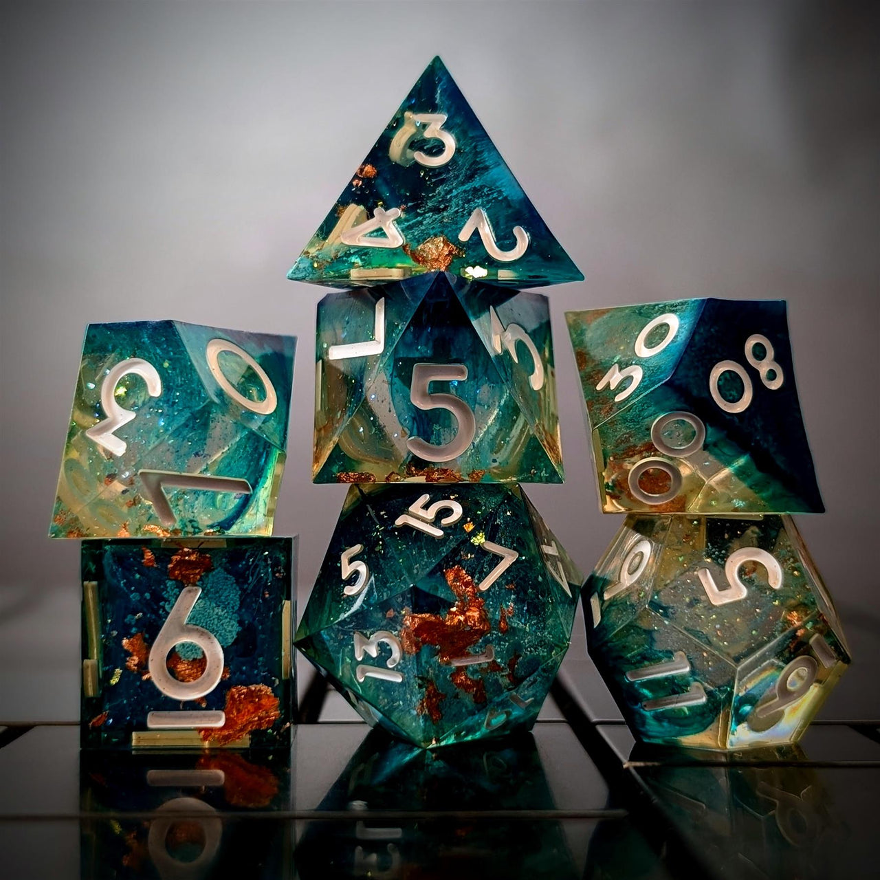 Blue Swirl in Clear with Copper Foil Sharp Resin - 7pcs RPG Dice Set