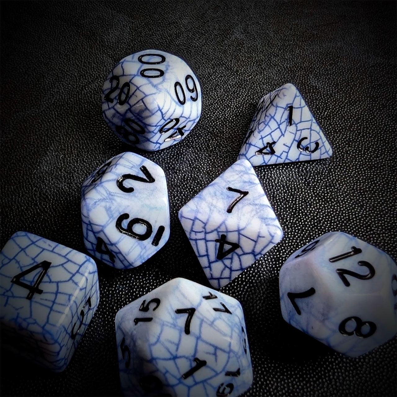 Cracked Blue on White Acrylic - 7pcs RPG Full Dice Set Scatter