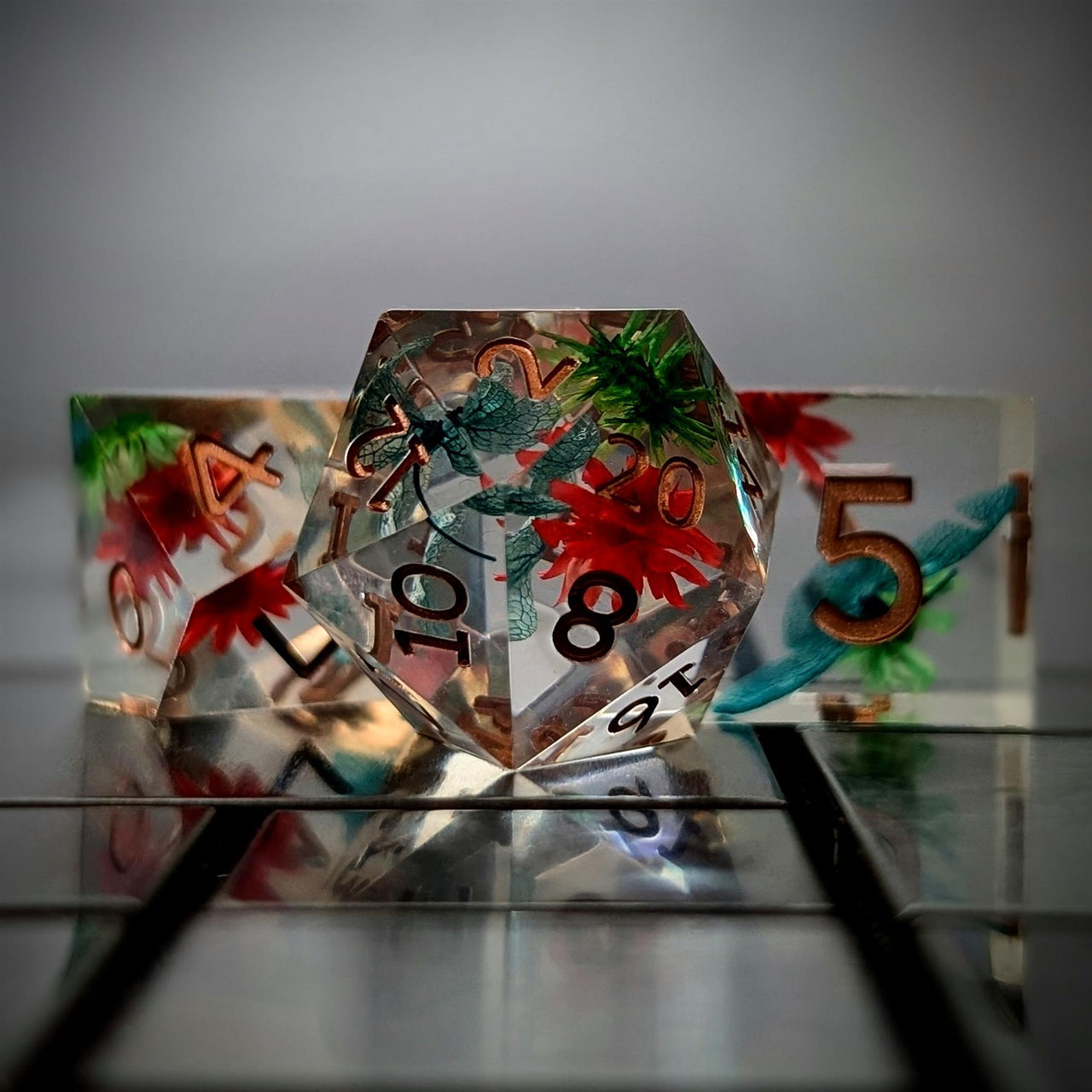 Red, Blue & Green Flowers in Clear Filled Sharp Resin - 7pcs RPG Dice Set