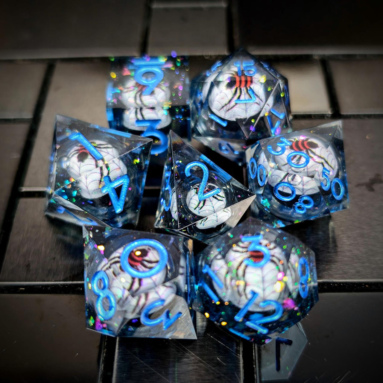 Spider Ball in Clear & Black Filled Sharp Resin - 7pcs RPG Dice Set