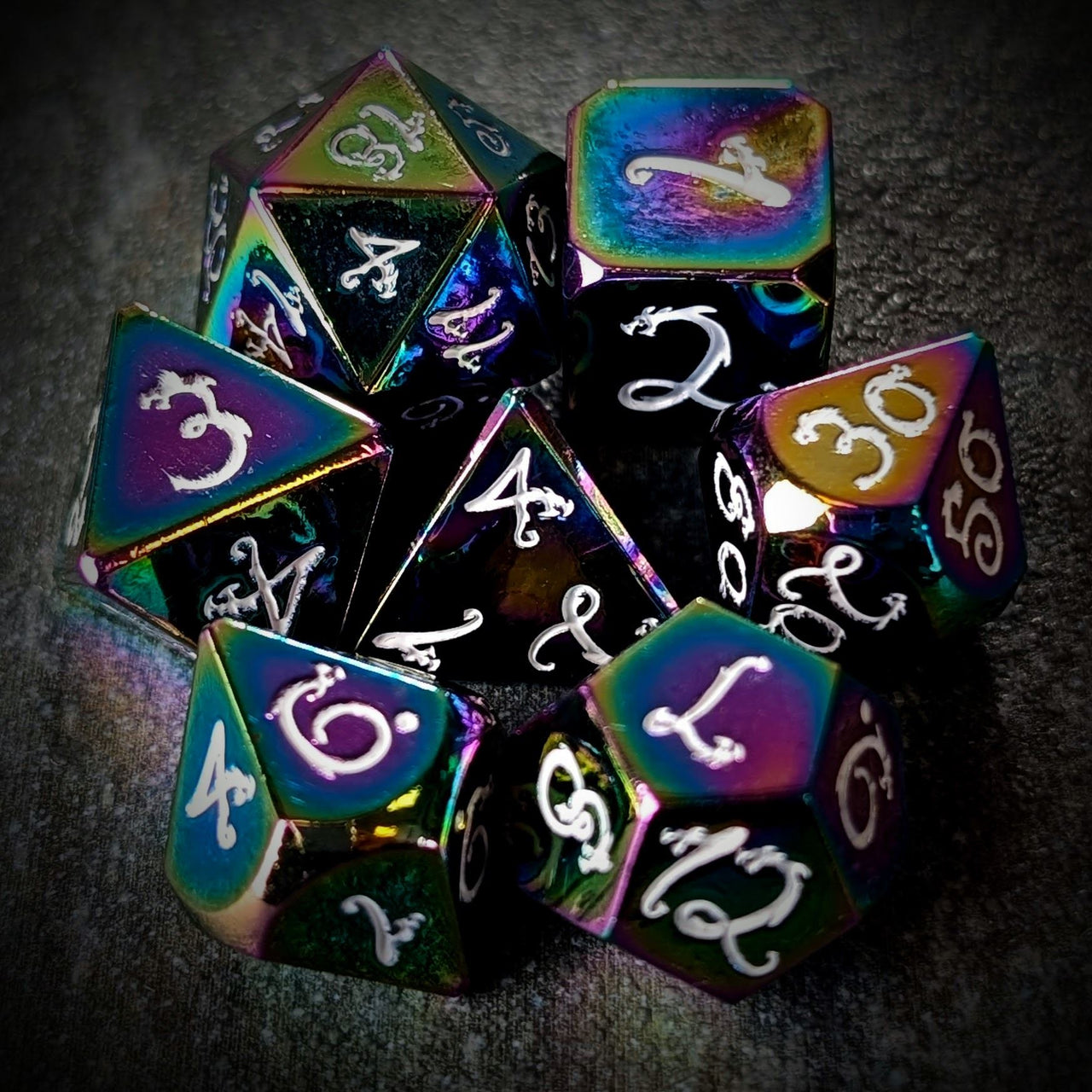 Rainbow Metal with White Dragon Font - 7pcs RPG Dice Set