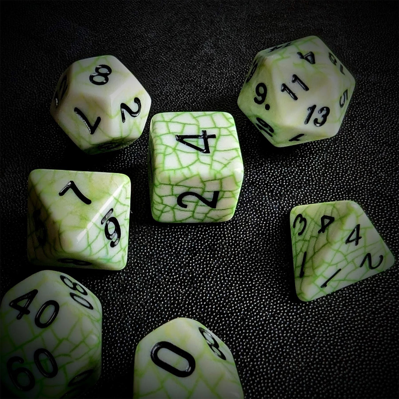 Cracked Green on White Acrylic - 7pcs RPG Full Dice Set Scatter