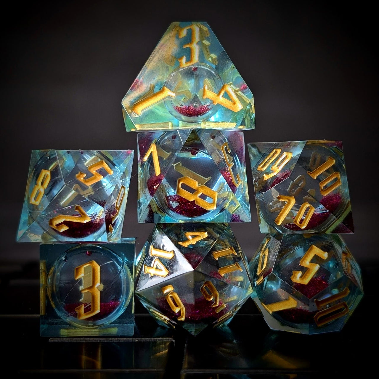 Pink Glitter in Blue & Clear Liquid Filled Sharp Resin - 7pcs RPG Dice Set