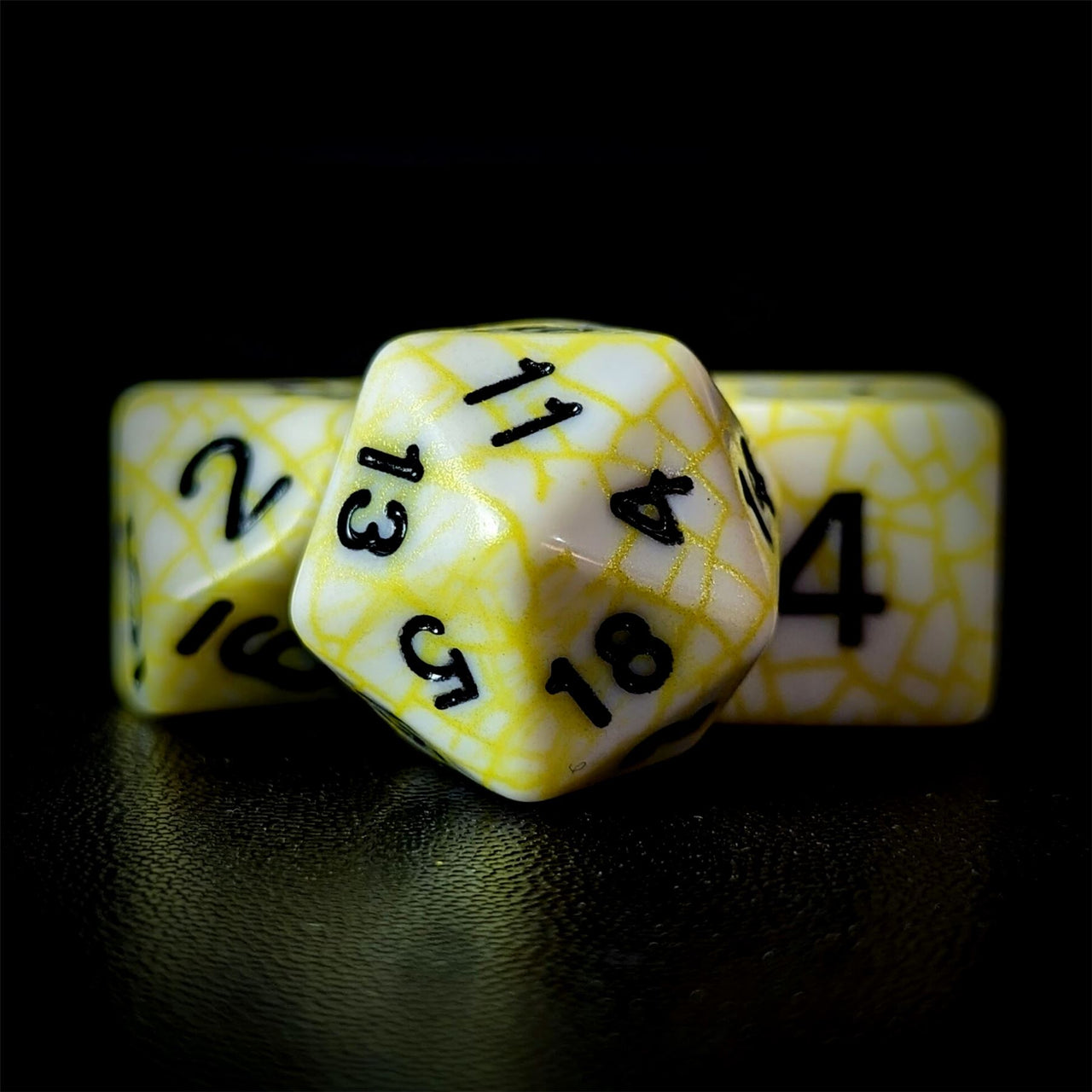 Cracked Yellow on White Acrylic - 7pcs RPG Full Dice Set Close