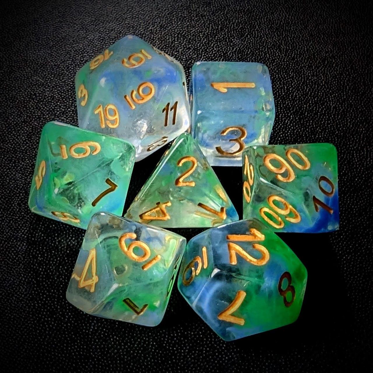 Blue & Green Swirl in Clear Resin - 7pcs RPG Full Dice Set