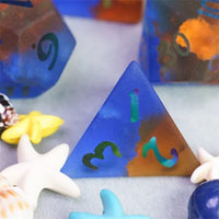 Thumbnail for Cracked & Frosted Orange and Blue Glass - 7pcs RPG Dice Set