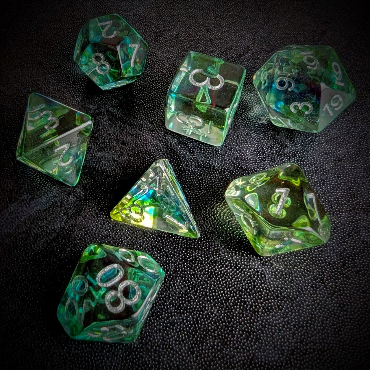 Green & Black with Blue Swirl in Clear Resin - 7pcs RPG Full Dice Set
