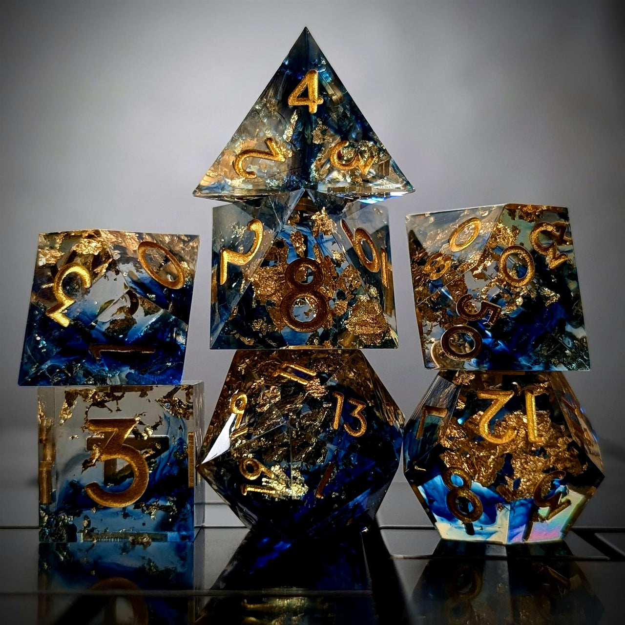 Blue Swirl in Clear with Gold Foil Sharp Resin - 7pcs RPG Dice Set