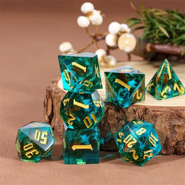 Gold Fish & Moss in Clear & Cyan Filled Sharp Resin - 7pcs RPG Dice Set