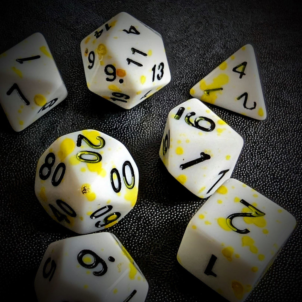 Yellow Blood Splatter on White Acrylic - 7pcs RPG Full Dice Set Scatter