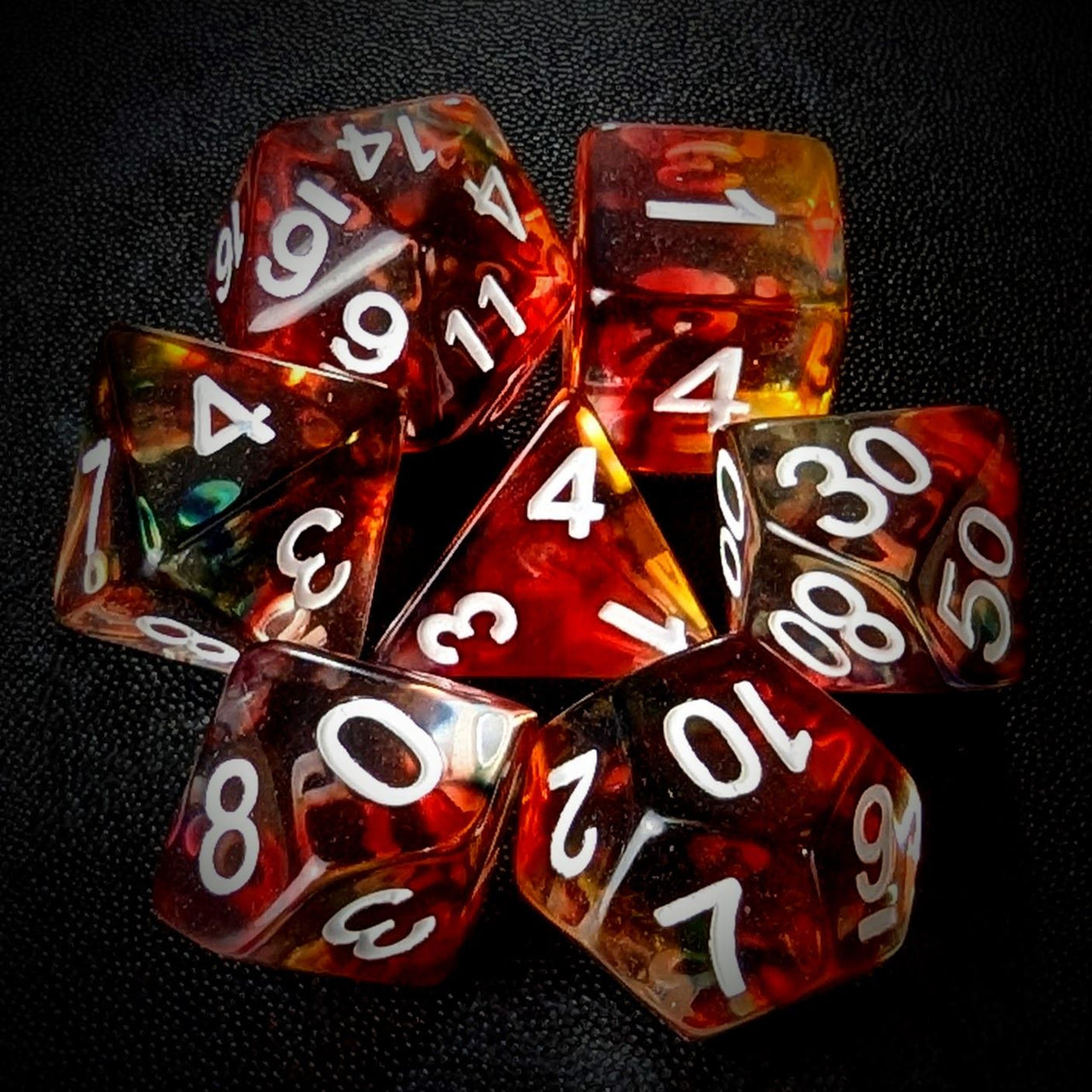 Red & Black with Blue Swirl in Clear Resin - 7pcs RPG Full Dice Set